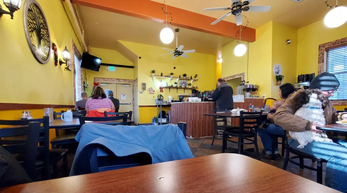 The yellow-walled dining room at Julio’s Coffee and Breakfast